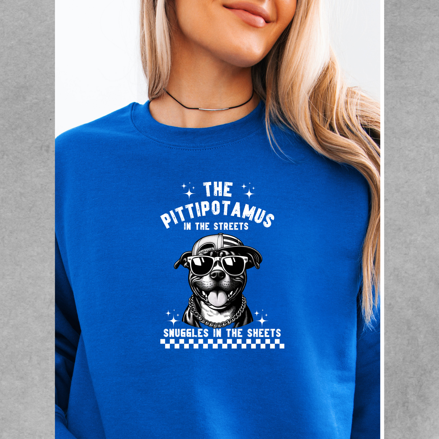 The pittipotamus snuggles in the sheets crewneck